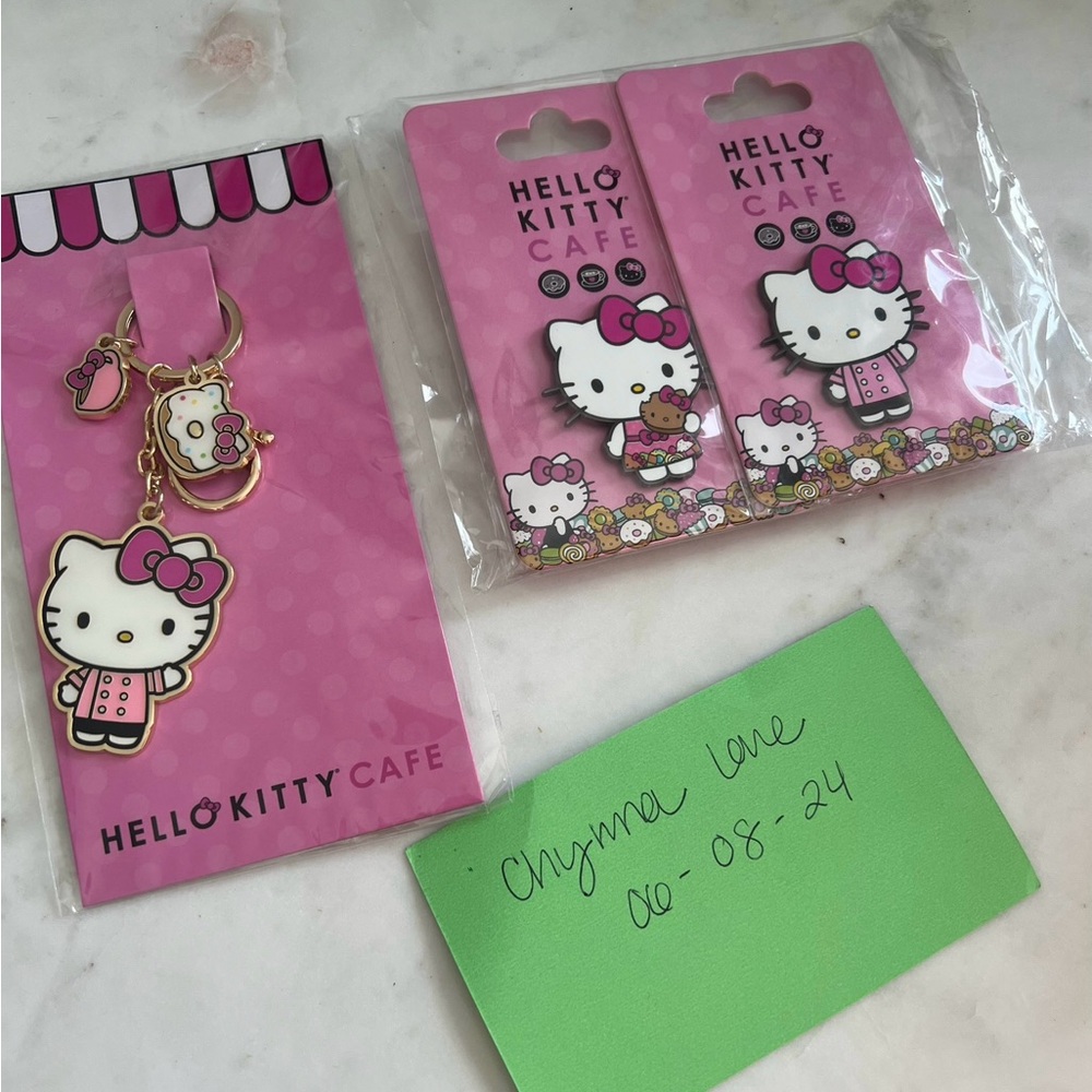 BRAND NEW HELLO KITTY CAFE KEYCHAIN WITH TWO FREE PINS